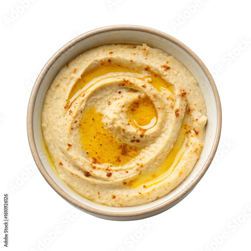 Creamy hummus topped with olive oil and spices.