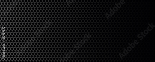 Black perforated metal plate. Metal grill. Black metal texture steel background. Perforated sheet metal.Abstract dark gray circle mesh pattern background texture.