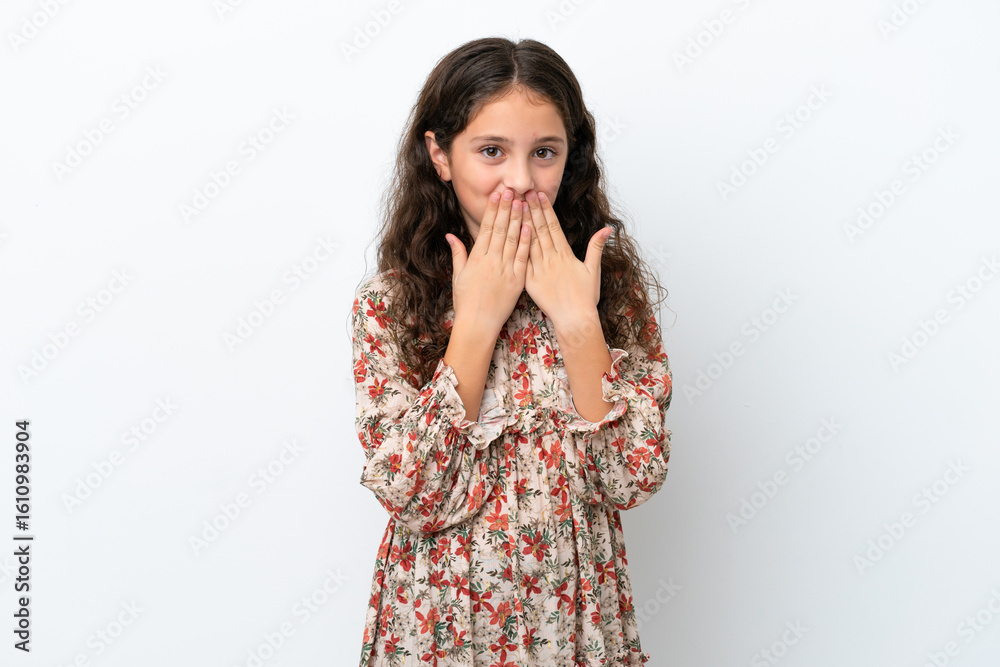 Little caucasian girl isolated on white background happy and smiling covering mouth with hands Little caucasian girl isolated on white background happy and smiling covering mouth with hands