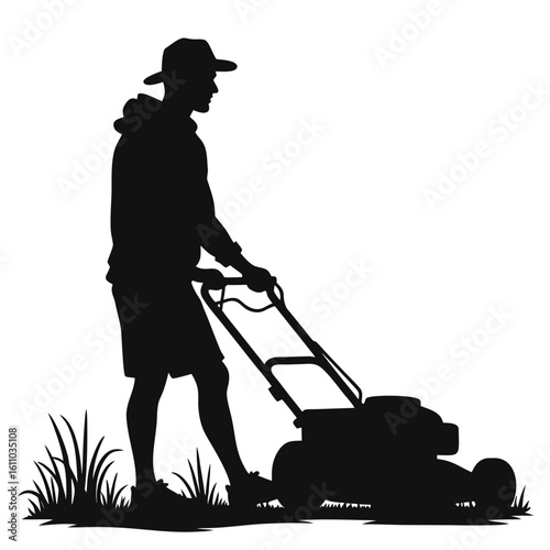 Man wearing hat and shorts mowing lawn with machine grass