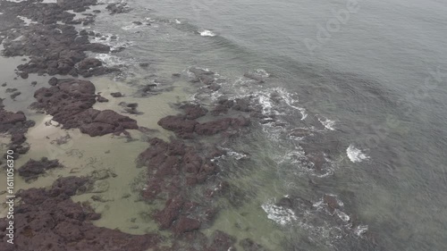 Aerial View of Goa Beach with Coconut Trees, Crashing Waves and Coastline