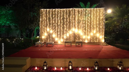 Indian Wedding Stage Decorated for Pooja Ritual with Fairy Lights Backdrop