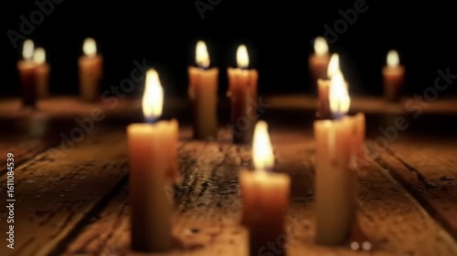 Many Candles Burning Brightly on a Rustic Wooden Table