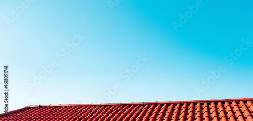 Vibrant red rooftop against a clear azure sky, red, sun