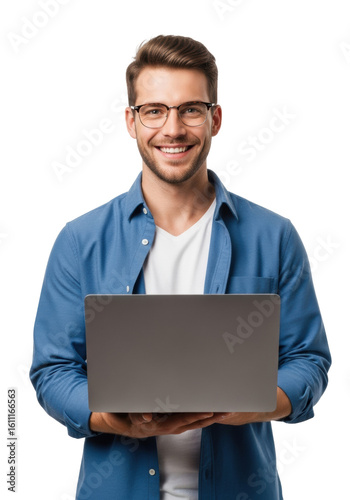 A young caucasian man in modern glasses and a blue work shirt, smiling confidently, holds an open sleek grey laptop on a transparent studio background with copy space, bright even lighting for a