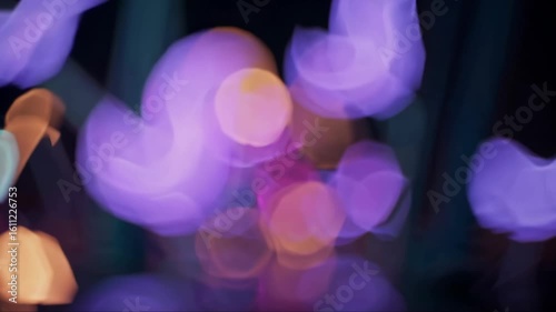 Electric lights create a mesmerizing atmosphere in a vibrant city at night