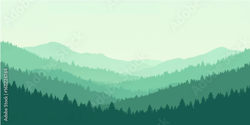 Mountain landscape with morning mist and sunrise over forested hills