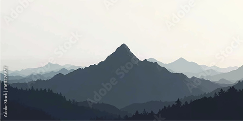 Misty mountain landscape at sunrise with fog and forest views