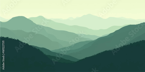 Foggy mountain landscape with clouds in the morning