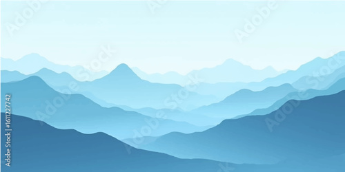 Sunrise over misty mountain peaks and a serene valley