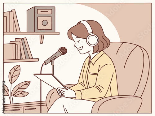 Woman recording a podcast at home in a cozy armchair with books and microphone