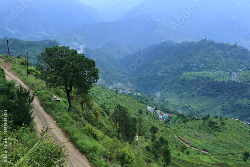 A panoramic view of the mountains of Tehri Garhwal, showing forests, mountains and beautiful villages.