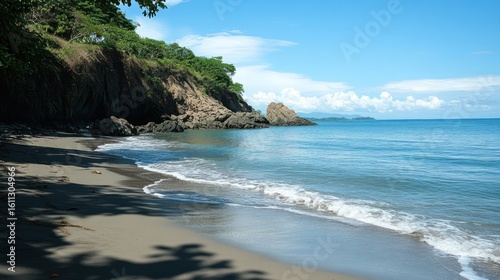 Secluded Tropical Coastline with Azure Waters and Lush Vegetation