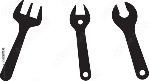 Black Silhouette Vector Graphic of Wrenches and Tools