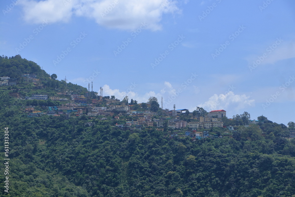 Fototapeta premium Narendra Nagar, located in Tehri Garhwal district of Uttarakhand, is a peaceful hill town known for its scenic beauty, royal history, and panoramic views of the Himalayas and the Ganga valley. 