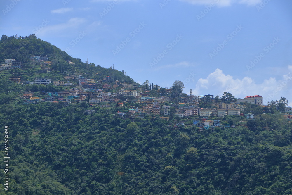 Fototapeta premium Narendra Nagar, located in Tehri Garhwal district of Uttarakhand, is a peaceful hill town known for its scenic beauty, royal history, and panoramic views of the Himalayas and the Ganga valley. 