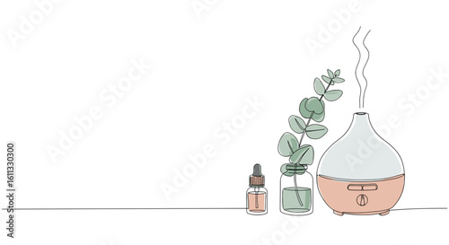 Aromatherapy diffuser and essential oils with eucalyptus branch  