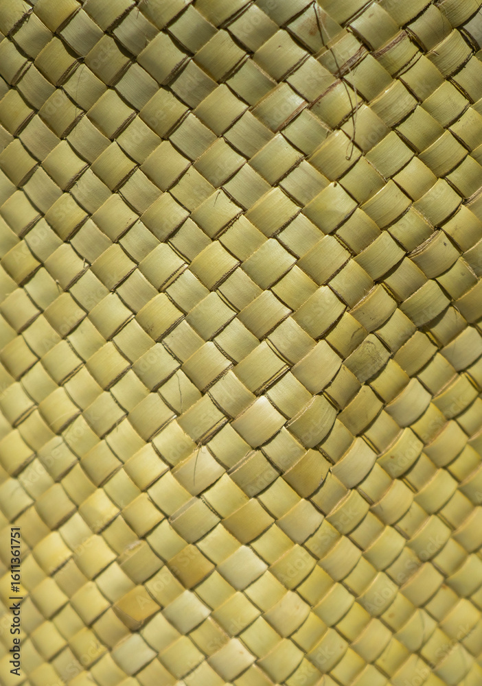 Fototapeta premium Details of traditional woven textures using natural organic materials. These originate from Atauro, Timor Leste. The photos can be used for backgrounds, textures, and patterns.