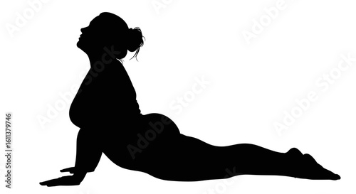 Plus-size woman practicing yoga in cobra pose silhouette  