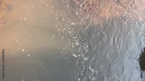 water flowing from the fountain