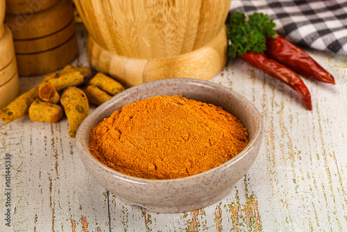 Fototapeta Naklejka Na Ścianę i Meble -  Tumeric curcuma powder for culinary