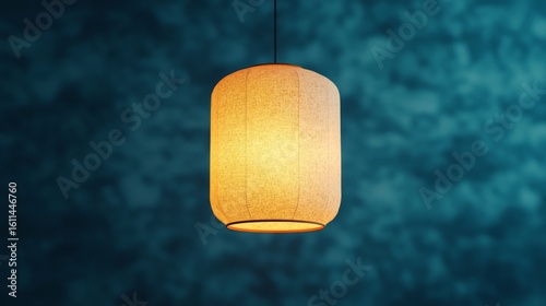 A single warm, glowing hanging paper lantern against a dark, textured blue background.
