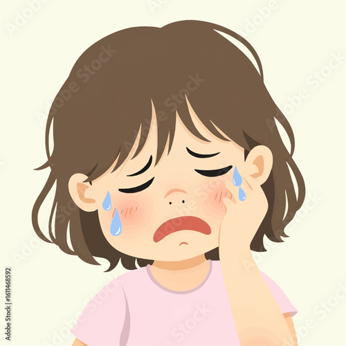 Little Girl Cries Sadly and Wipes Her Tears with Her Hand