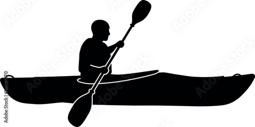 Silhouette kayaker paddling on water