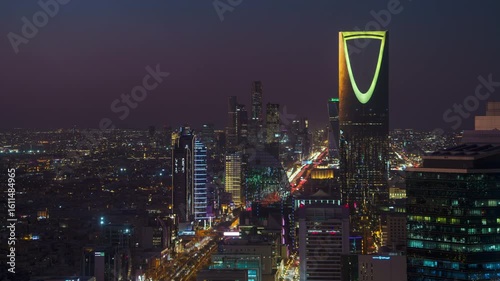 Breathtaking timelapse from the top of Faisaliah Tower, the sunset view of the skyline of Riyadh, Saudi Arabia, dominated by the iconic Kingdom Centre