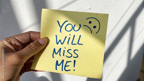 “YOU WILL MISS ME!” Handwritten Sticky Note with Sad Face – Dramatic Farewell Message on Light Surface