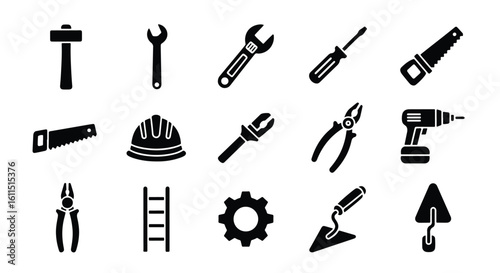 A collection of construction and repair tools, including a hammer, wrench, and drill