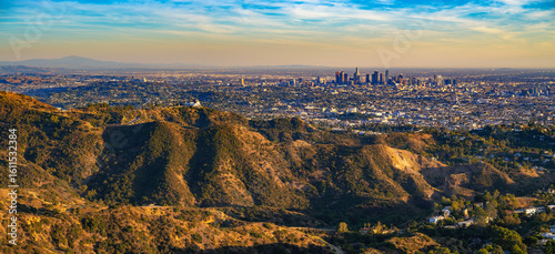 Panorama of Griffith Observatory and Los Angeles skyline photographed from Mount Lee at sunset.