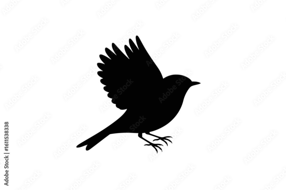 Fototapeta premium Small bird in flight flying silhouette