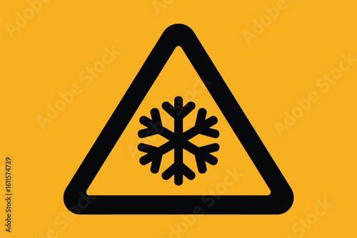 Warning sign with snowflake symbol indicating icy conditions or winter weather
