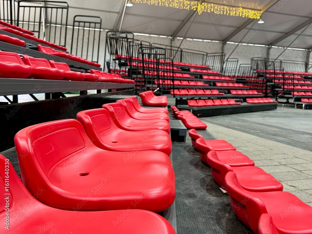 Fototapeta premium Polymer Retractable Telescopic Seating or Bleachers in a warehouse. Adaptable and efficiently recover floor space.