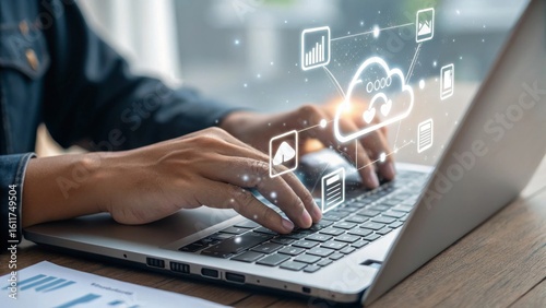 Business Professional Engaging with Cloud Technology on Laptop