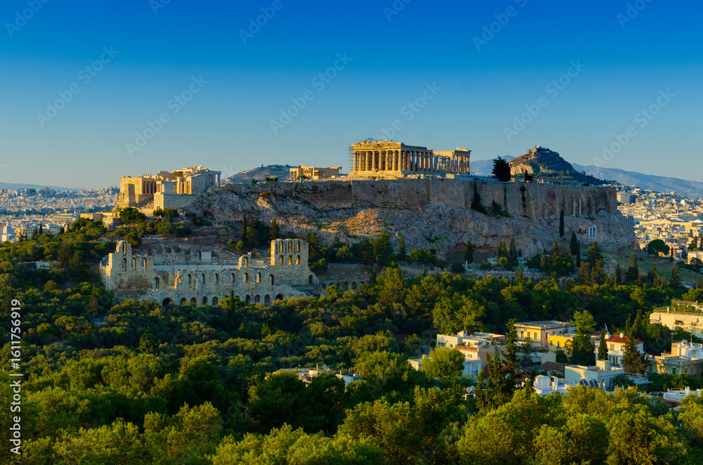 Evening view of The Erechtheion at The Parthenon and ancient Acropolis in Athens Greece Evening view of The Erechtheion at The Parthenon and ancient Acropolis in Athens Greece