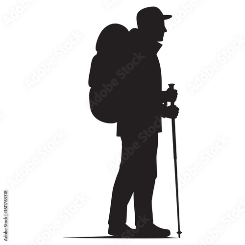 Silhouette of a hiker with backpack and trekking pole hiking in the outdoors