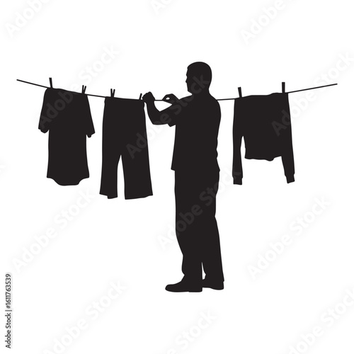 Silhouette of a man hanging laundry on a clothesline against a white background