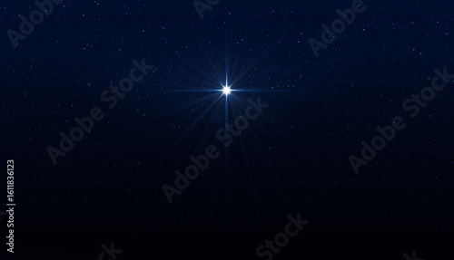 Glowing star in the night sky. Symbol of Christmas and New Year.