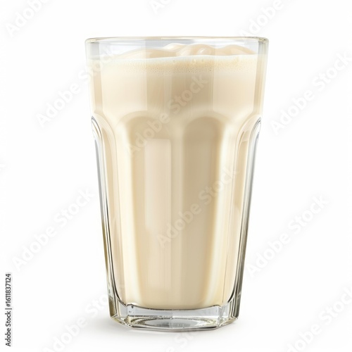 Refreshing protein shake is being poured and creating bubbles in a transparent glass on white background
