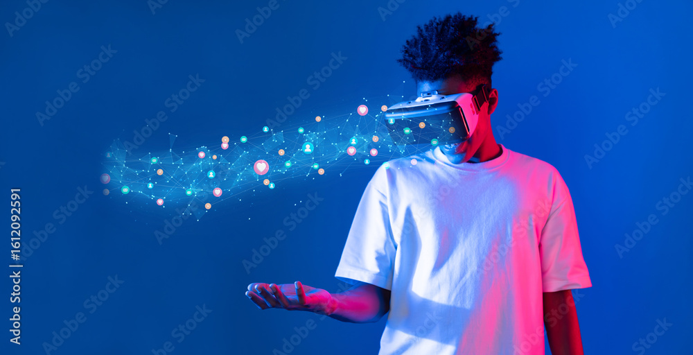 Fototapeta premium A young individual engages with virtual reality, showcasing the intersection of technology and social media. Colorful lights and digital elements enhance the immersive experience. XDMCP