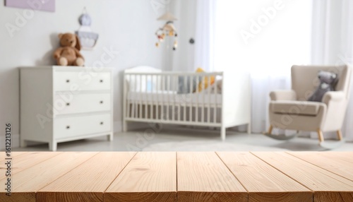 Wooden table top in a blurred nursery