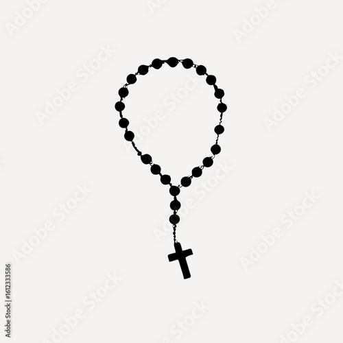 Black rosary beads with cross pendant on white background

