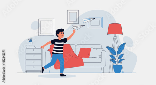 Cheerful child playing with paper airplanes indoor with a modern living room background and decoration for playful childhood concept