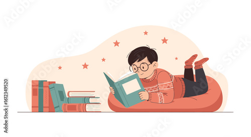 Boy engrossed in reading a book, lying comfortably on a beanbag with books
