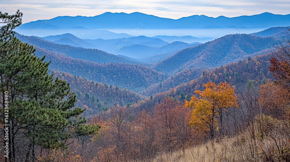 Fototapeta premium Autumnal mountain vista, hazy blue ridges, vibrant foliage