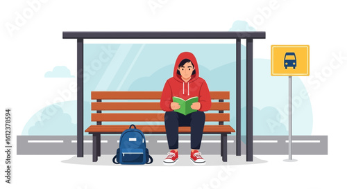 Teenager Enjoying A Novel At The Bus Station On The Way To School