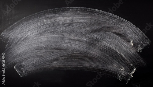 abstract chalk rubbed out on a chalkboard or school board isolated with clean space for educational concepts