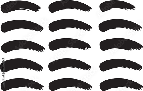 Black brush strokes arranged on white background for creative graphic design elements